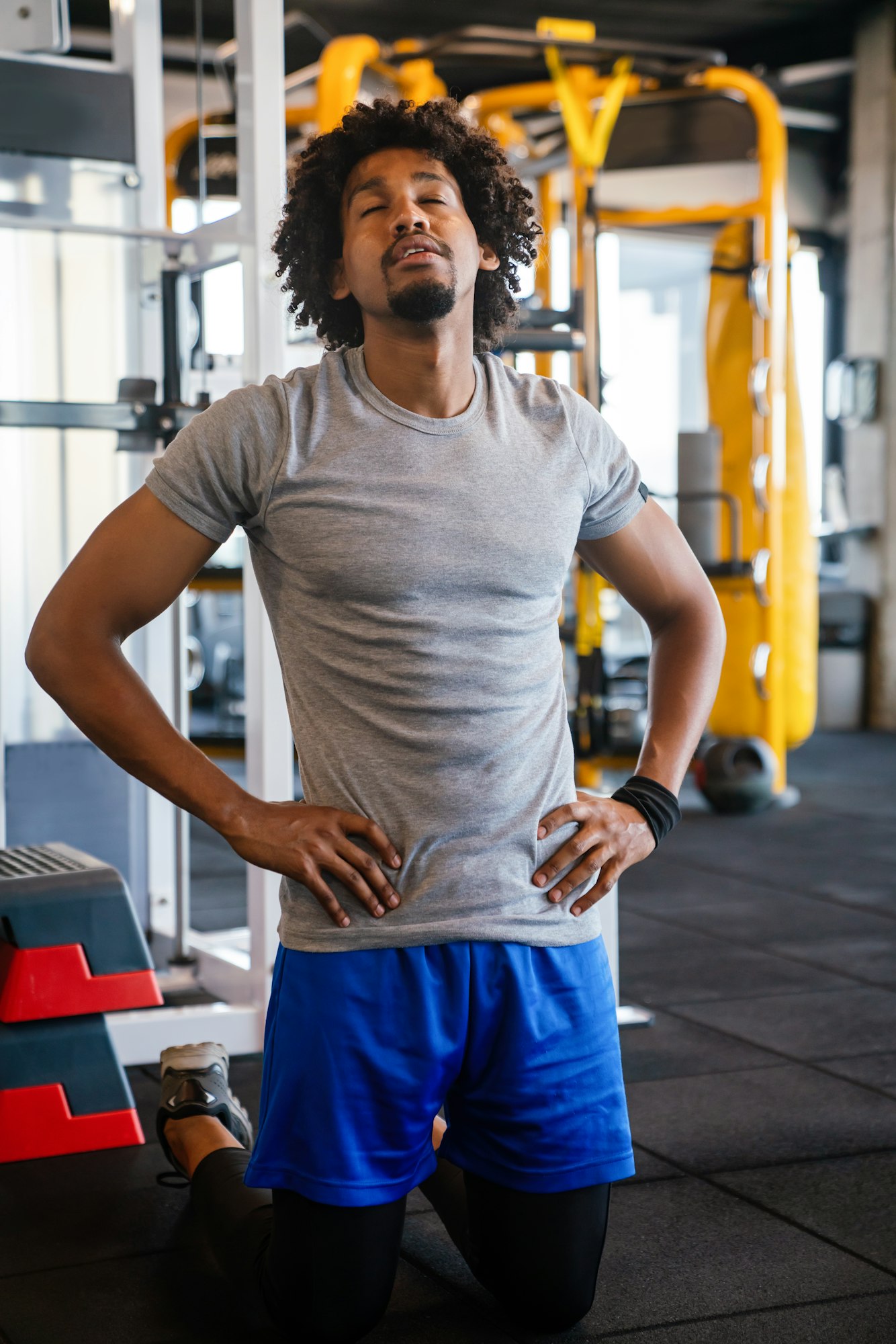 Fitness man tired relaxed after workout exercise