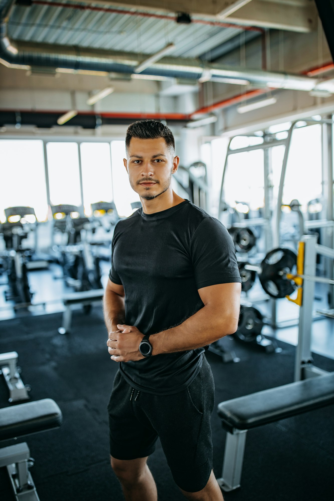 Posing for picture, at gym.