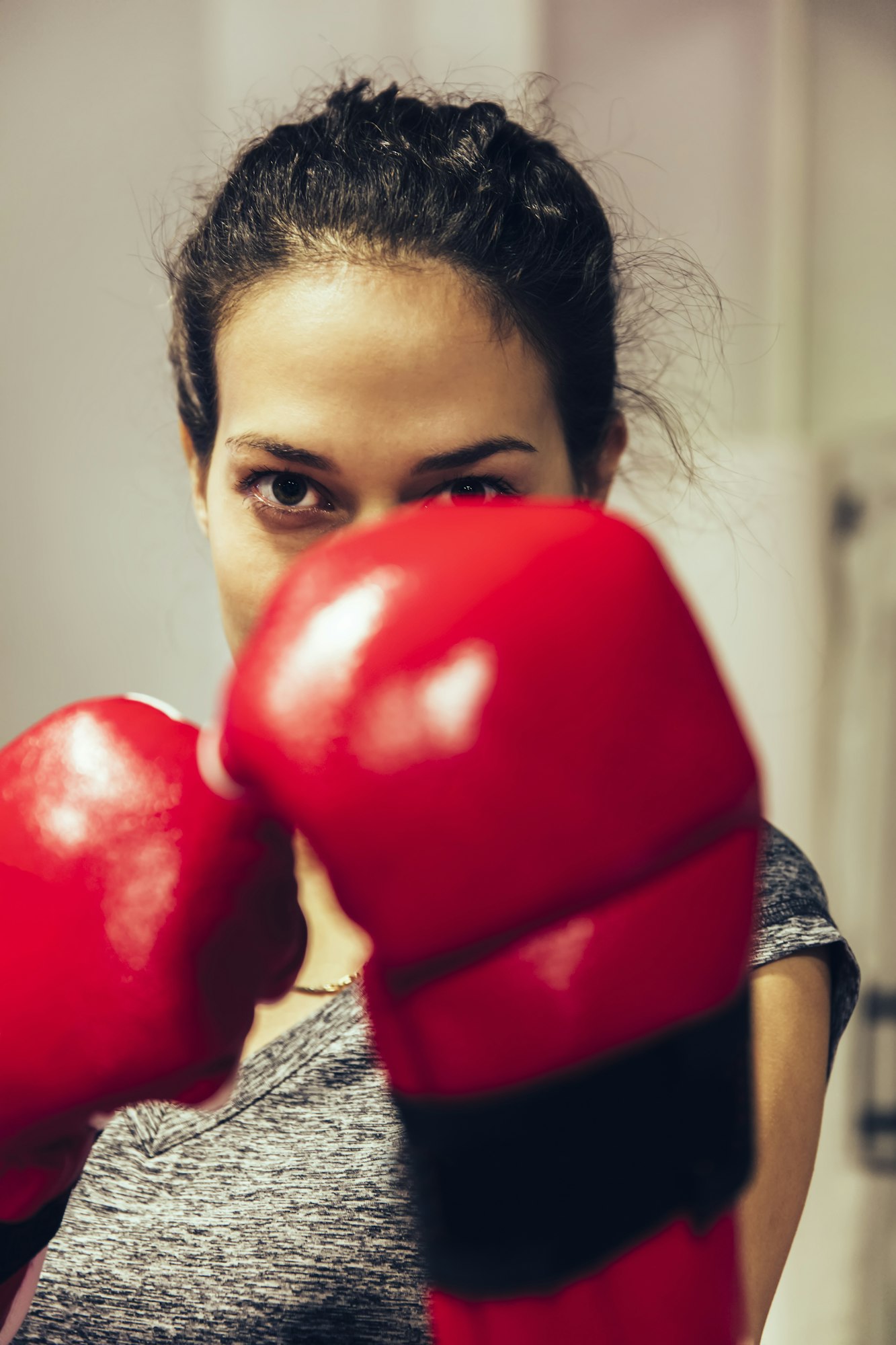 Young woman practicing boxing